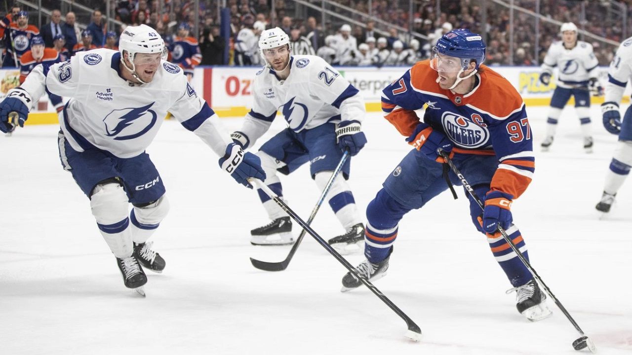 Tampa Bay goalie Andrei Vasilevskiy (88) makes a save on Edmonton Oilers' Leon Draisaitl (29) during the second period of Edmonton's 2-1 win against Tampa Bay Tuesday night. (Jason Franson/The Canadian Press via AP) 