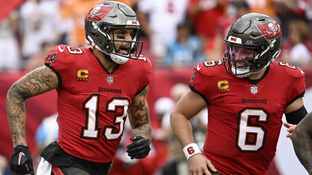 Tampa Bay Buccaneers wide receiver Mike Evans celebrates after scoring with quarterback Baker Mayfield against the Carolina Panthers during the first half of an NFL football game Sunday, Dec. 29, 2024, in Tampa, Fla. (AP Photo/Jason Behnken)