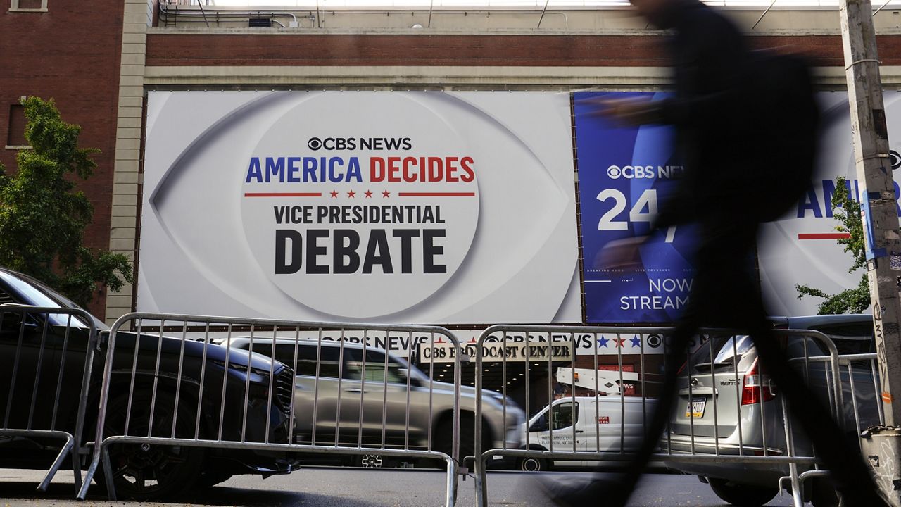 A day ahead of a CBS News vice presidential debate between Republican vice presidential nominee Sen. JD Vance, R-Ohio, and Democratic vice presidential nominee Minnesota Gov. Tim Walz, in New York., Monday, Sept. 30, 2024. (AP Photo/Matt Rourke)