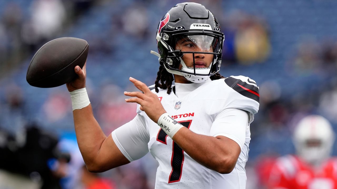 Houston Texans quarterback C.J. Stroud warms up before an NFL football game against the New England Patriots, Sunday, Oct. 13, 2024, in Foxborough, Mass. (AP Photo/Steven Senne)