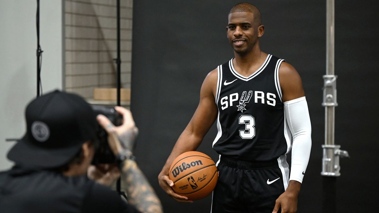 San Antonio Spurs guard Chris Paul (3) poses during the NBA basketball team's media day, Monday, Sept. 30, 2024, in San Antonio. (AP Photo/Darren Abate)