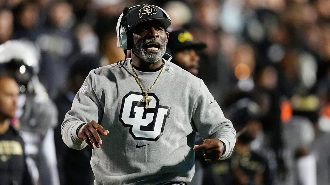 Colorado head coach Deion Sanders directs his team against Cincinnati in the first half of an NCAA college football game Saturday, Oct. 26, 2024, in Boulder, Colo. (AP Photo/David Zalubowski)