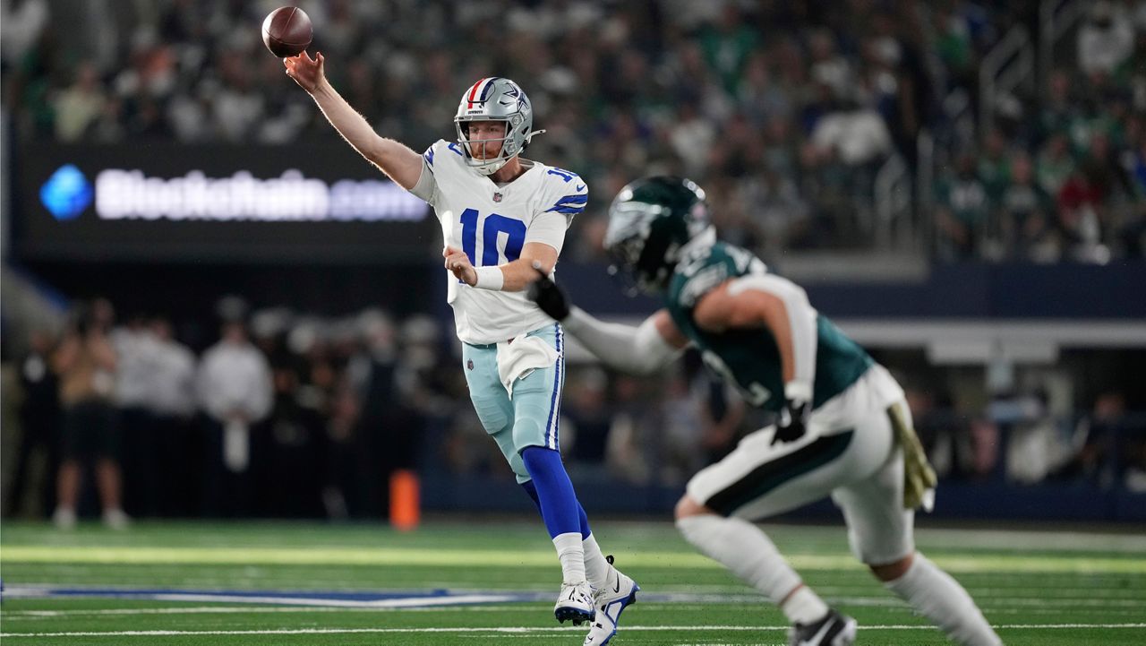 Dallas Cowboys quarterback Cooper Rush (10) throws a pass in the first half of an NFL football game against the Philadelphia Eagles in Arlington, Texas, Sunday, Nov. 10, 2024. (AP Photo/Jeffrey McWhorter)