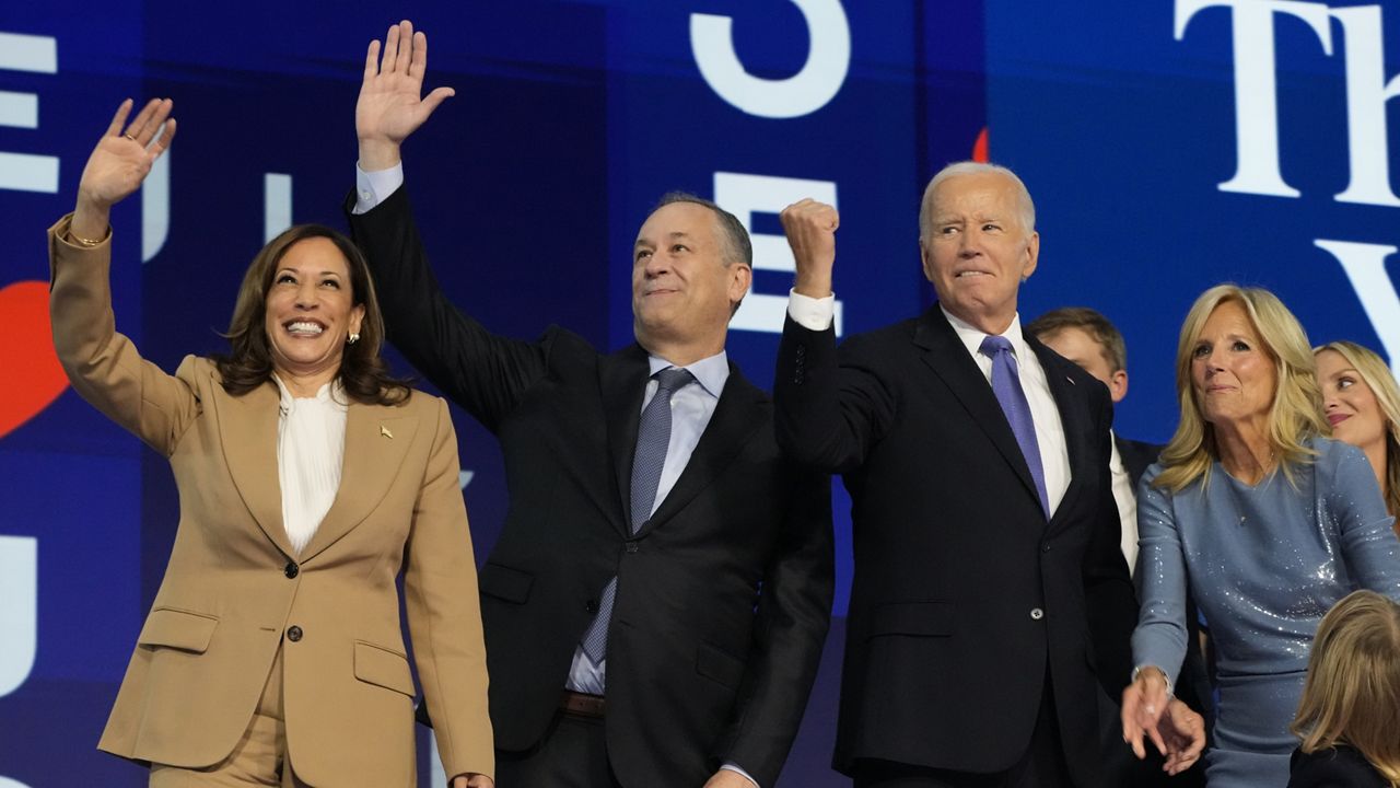 President Joe Biden and first lady Jill Biden stand on stage with Democratic presidential nominee Vice President Kamala Harris and second gentleman Doug Emhoff during the first day of Democratic National Convention, Monday, Aug. 19, 2024, in Chicago. (AP Photo/Jacquelyn Martin)