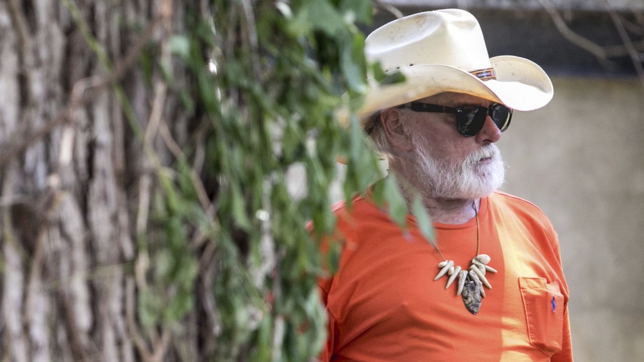 Guitarist Dickey Betts, founding member of The Allman Brothers Band, attends Gregg Allman's burial at Rose Hill Cemetery, Saturday, June 3, 2017, in Macon, Ga. (AP Photo/Branden Camp)