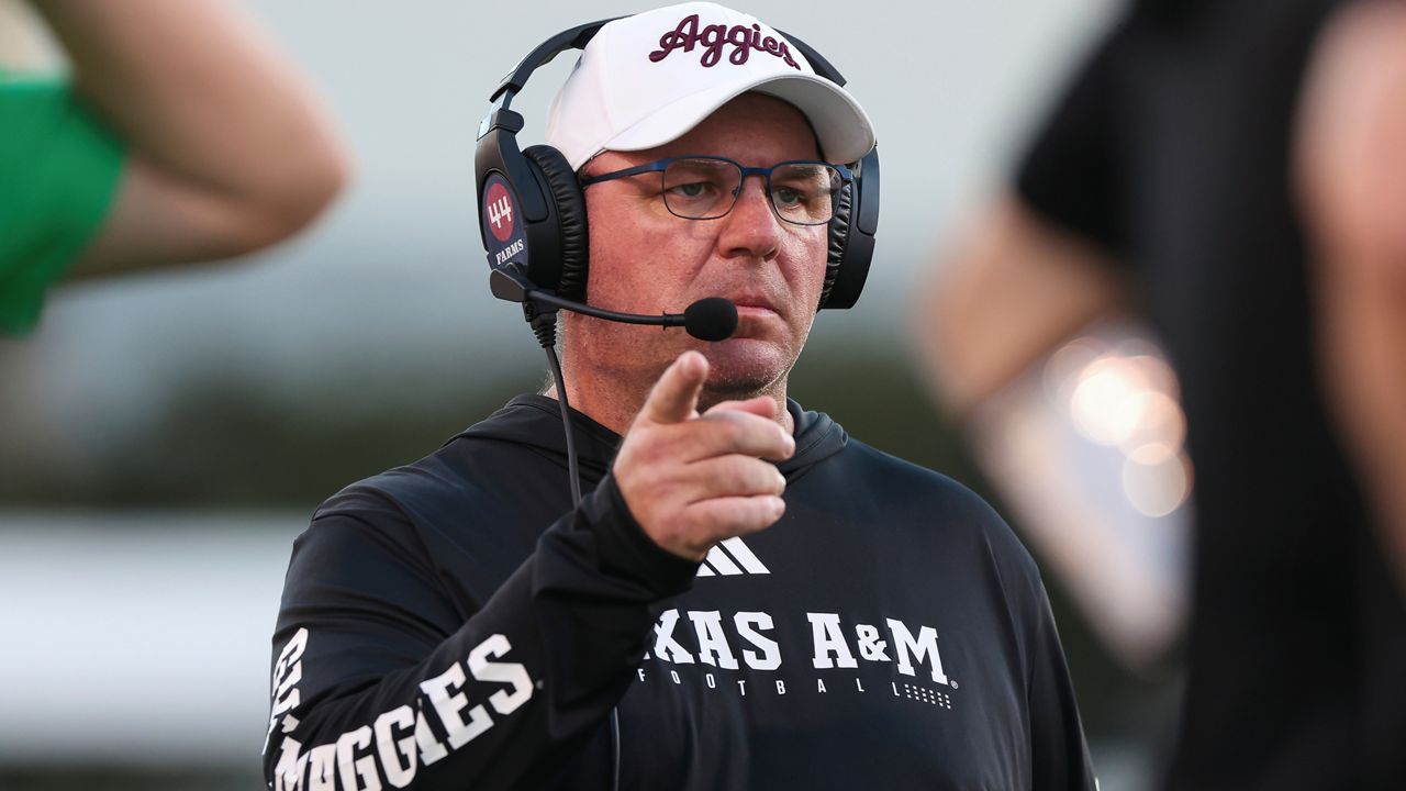 Texas A&M head coach Mike Elko is seen during the second half of an NCAA college football game against Mississippi State, Saturday, Oct. 19, 2024, in Starkville, Miss. (AP Photo/Randy J. Williams)