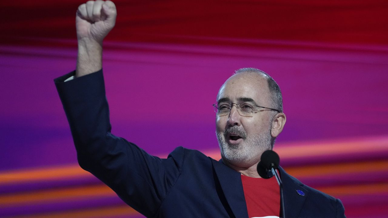 Shawn Fain, president of the United Automobile Workers, speaks during the Democratic National Convention Monday, Aug. 19, 2024, in Chicago. (AP Photo/Paul Sancya)