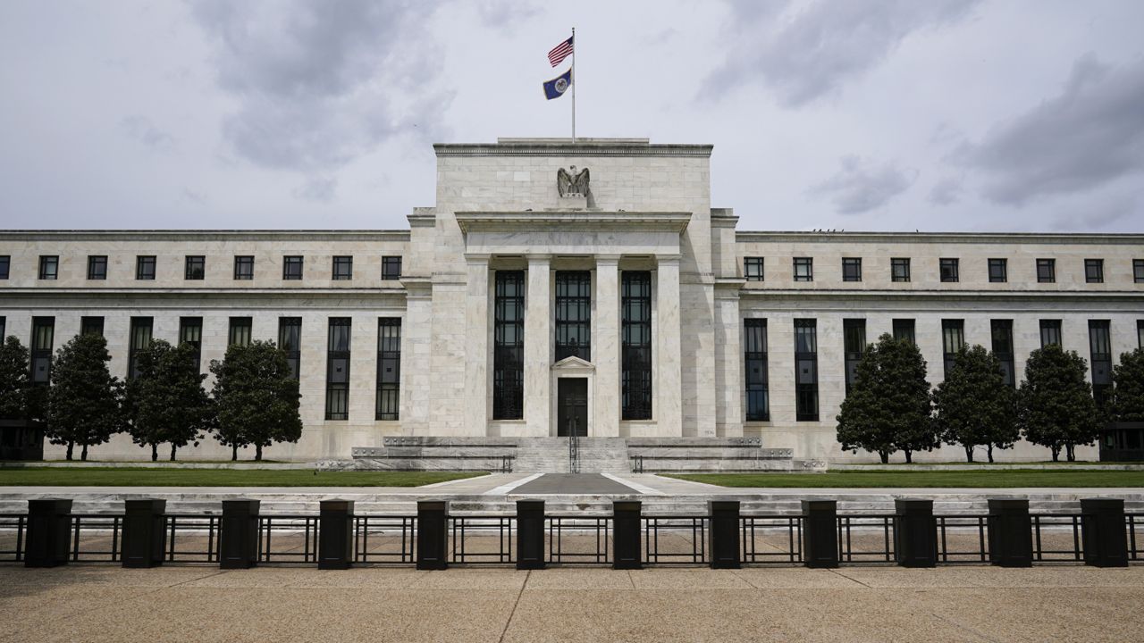 FILE: This May 4, 2021, photo shows the Federal Reserve building in Washington. (AP Photo/Patrick Semansky)