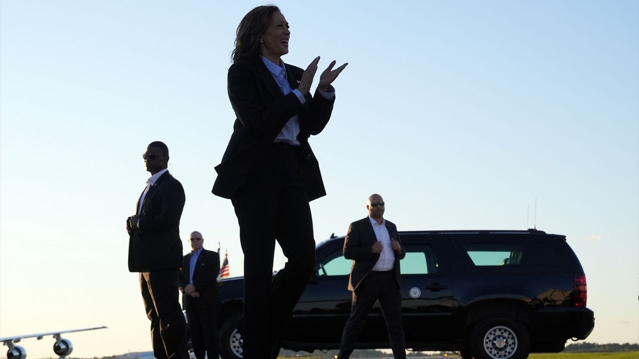 Democratic presidential nominee Vice President Kamala Harris walks to greet staff members before boarding Air Force Two at Pittsburgh International Airport in Pittsburgh, Monday, Sept. 2, 2024. (AP Photo/Jacquelyn Martin)