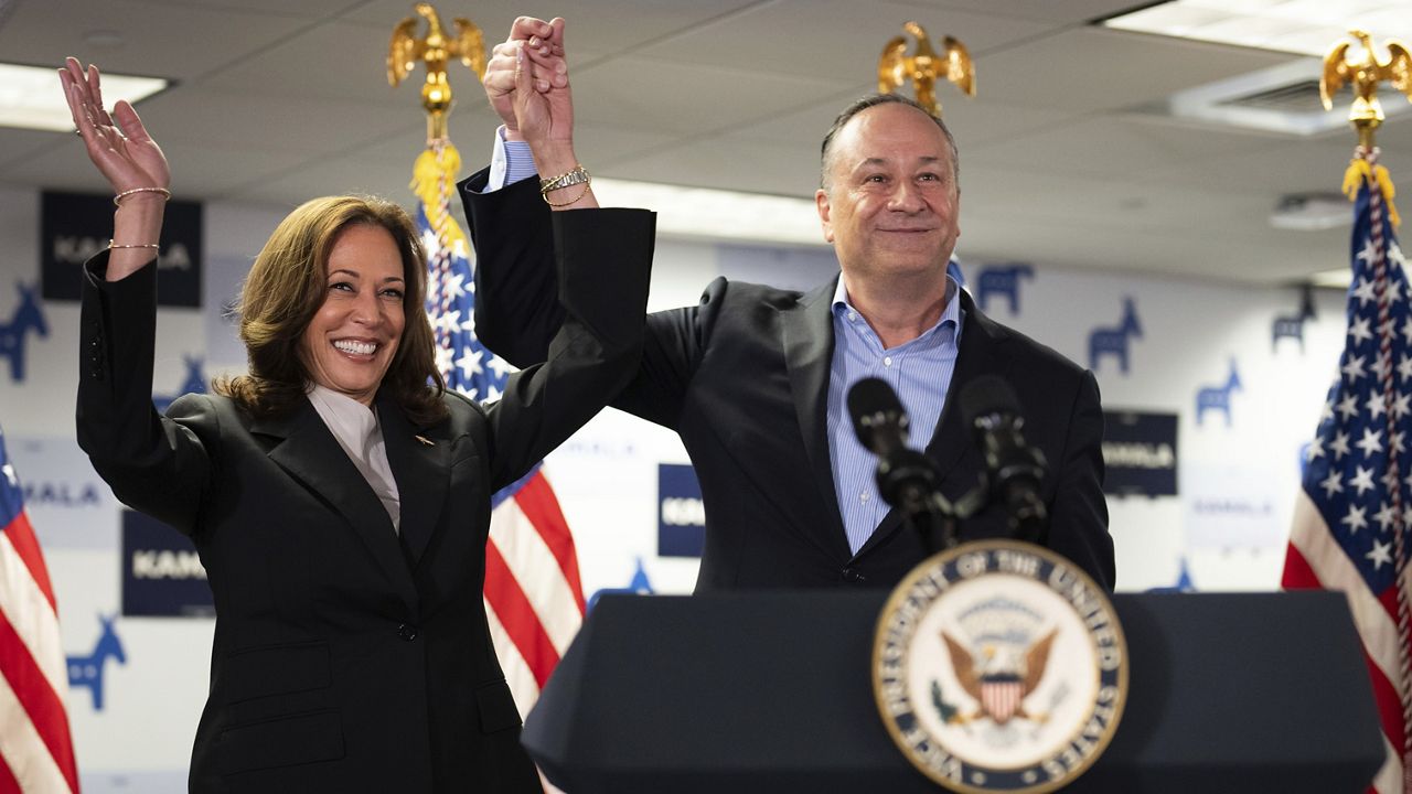 Vice President Kamala Harris, left, and second gentleman Doug Emhoff address staff at her campaign headquarters in Wilmington, Del., Monday, July 22, 2024. (Erin Schaff/The New York Times via AP, Pool)