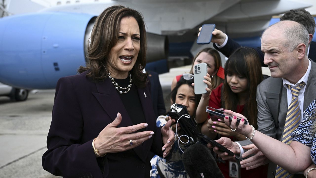 Vice President Kamala Harris speaks to reporters upon arrival at Andrews Air Force Base, Md., Thursday, July 25, 2024. Harris is returning to Washington from Texas and she is scheduled to meet with Israeli Prime Minister Benjamin Netanyahu. (Brendan Smialowski/Pool via AP)