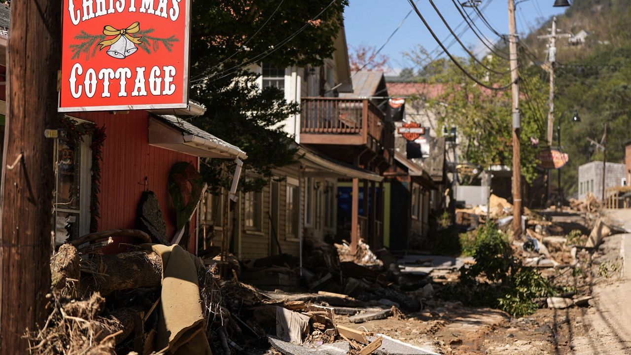 Business are seen in a debris field in the aftermath of Hurricane Helene, Wednesday, Oct. 2, 2024, in Chimney Rock Village, N.C. (AP Photo/Mike Stewart)