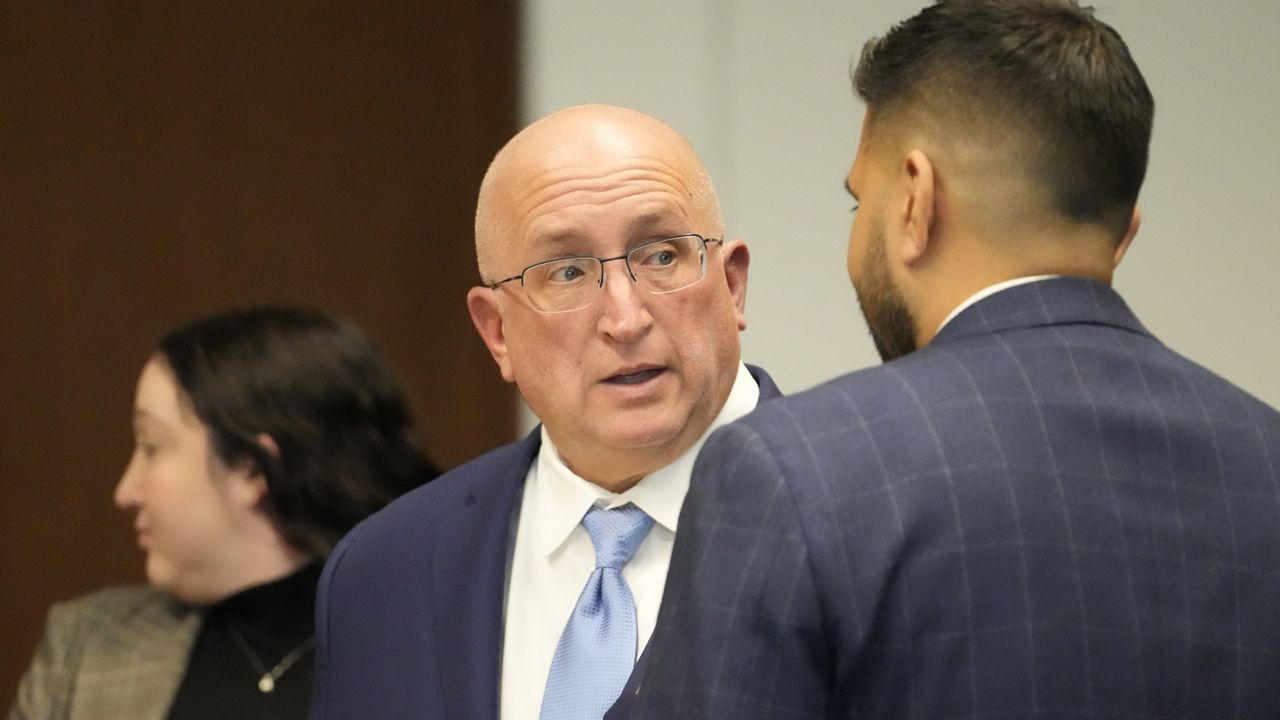 Robert E. Crimo Jr., talks to his attorney George Gomez as he appears before Judge George D. Strickland at the Lake County Courthouse, Monday, Nov. 6, 2023, in Waukegan, Ill. (AP Photo/Nam Y. Huh, Pool)