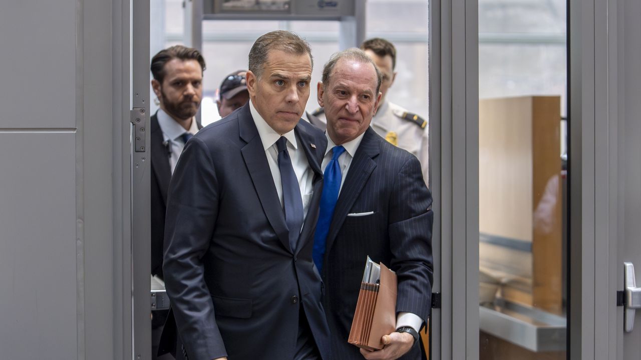 Hunter Biden, left, son of President Joe Biden, arrives with attorney Abbe Lowell at the O'Neill House Office Building for a closed-door deposition in a Republican-led investigation into the Biden family, on Capitol Hill in Washington, Wednesday, Feb. 28, 2024. (AP Photo/J. Scott Applewhite)