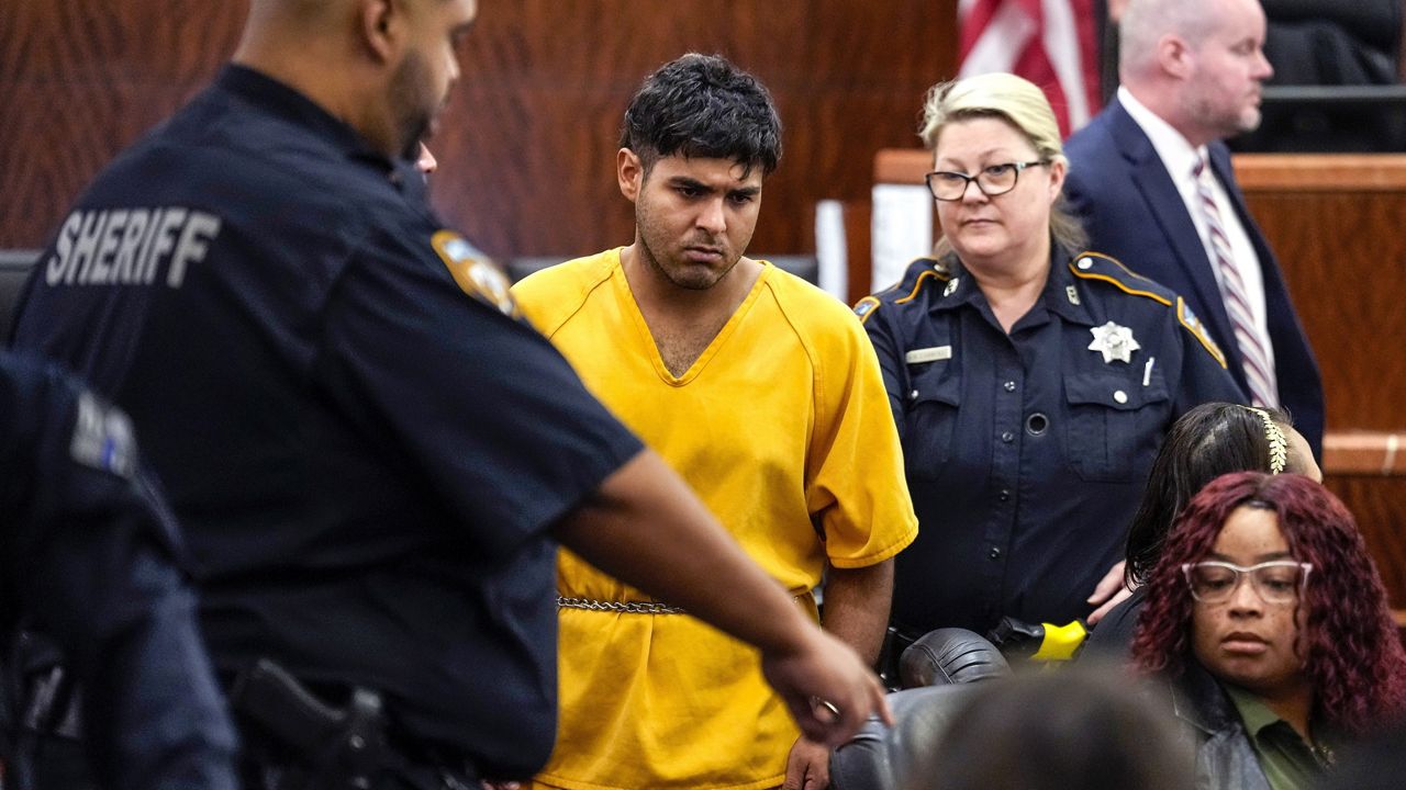 Johan Jose Martinez-Rangel, one of the two men accused of killing 12-year-old Jocelyn Nungaray, is led from the courtroom by deputies on Tuesday, June 25, 2024 in Houston. (Brett Coomer/Houston Chronicle via AP, File)