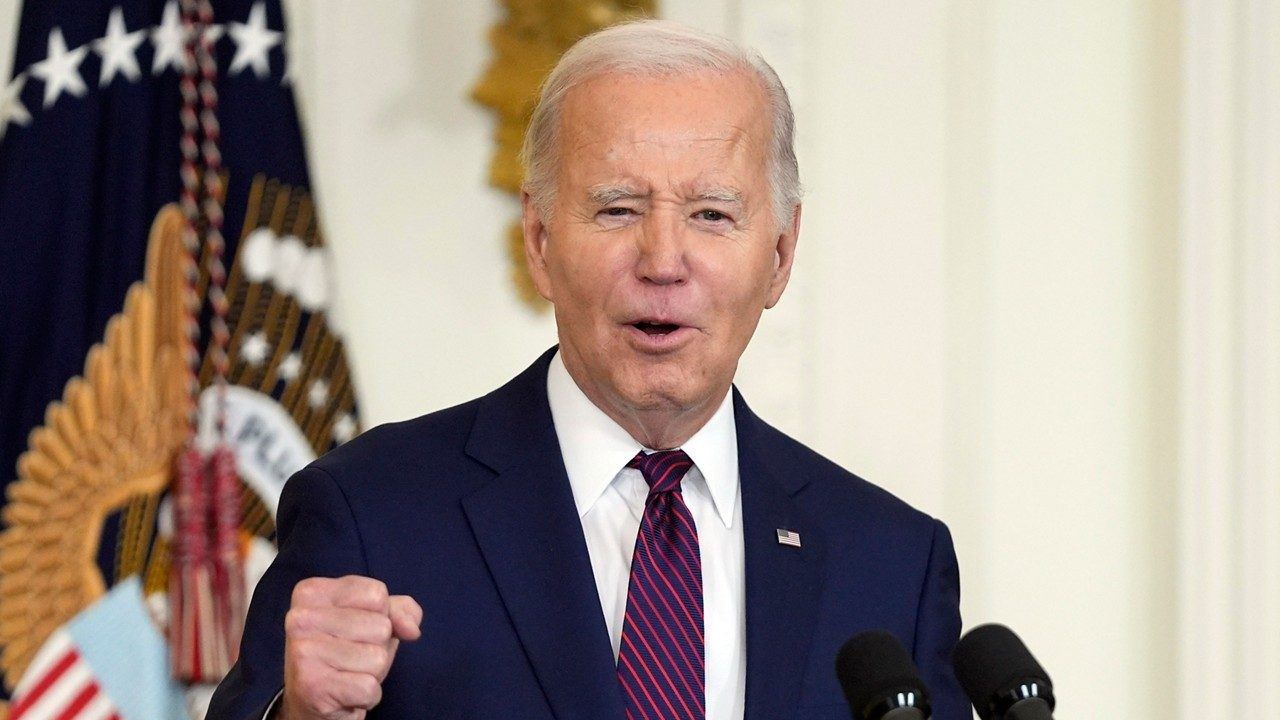 President Joe Biden speaks in the East Room, Jan. 19, 2024, in Washington. The New Hampshire attorney general's office says it is investigating reports of an apparent robocall that used artificial intelligence to mimic Biden's voice and discourage voters in the state from participating in the primary election on Tuesday, Jan. 23. Attorney General John Formella said Monday, Jan. 22, that the recorded message that was sent Sunday appears to be an illegal attempt to disrupt and suppress voting. (AP Photo/Evan Vucci)