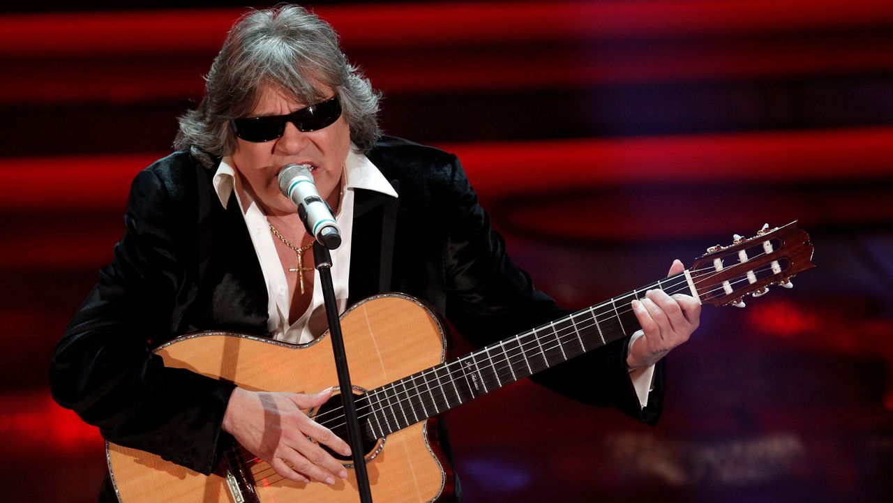 Singer and guitarist Jose' Feliciano of Puerto Rico performs during the 62nd edition of the Sanremo Song Festival, in Sanremo, Italy, Thursday, Feb. 16, 2012. (AP Photo/Luca Bruno)