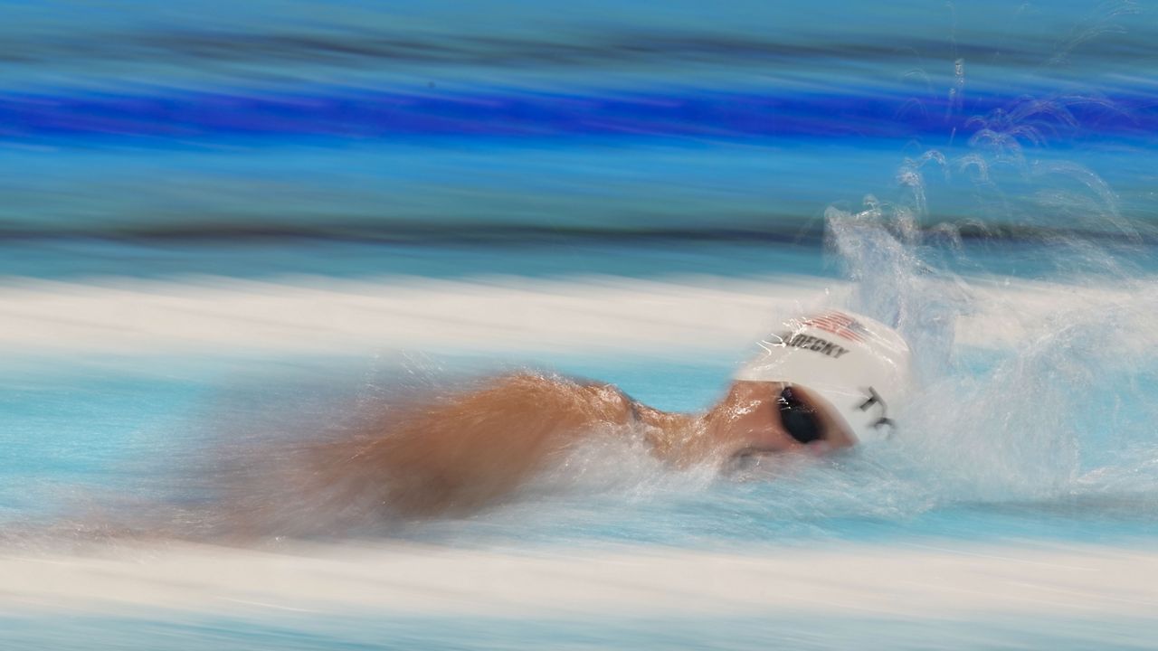 Katie Ledecky, of the United States, competes during a heat in the women's 1500-meter freestyle at the 2024 Summer Olympics, Tuesday, July 30, 2024, in Nanterre, France. (AP Photo/Ashley Landis)