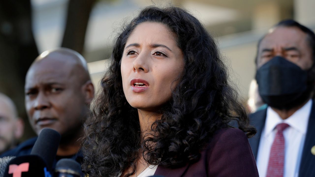 Harris County Judge Lina Hidalgo, center, flanked by Houston Police Chief Troy Finner, left, and U.S. Rep. Al Green, right, speaks during a news conference, Nov. 6, 2021, in Houston. (AP Photo/Michael Wyke, File)