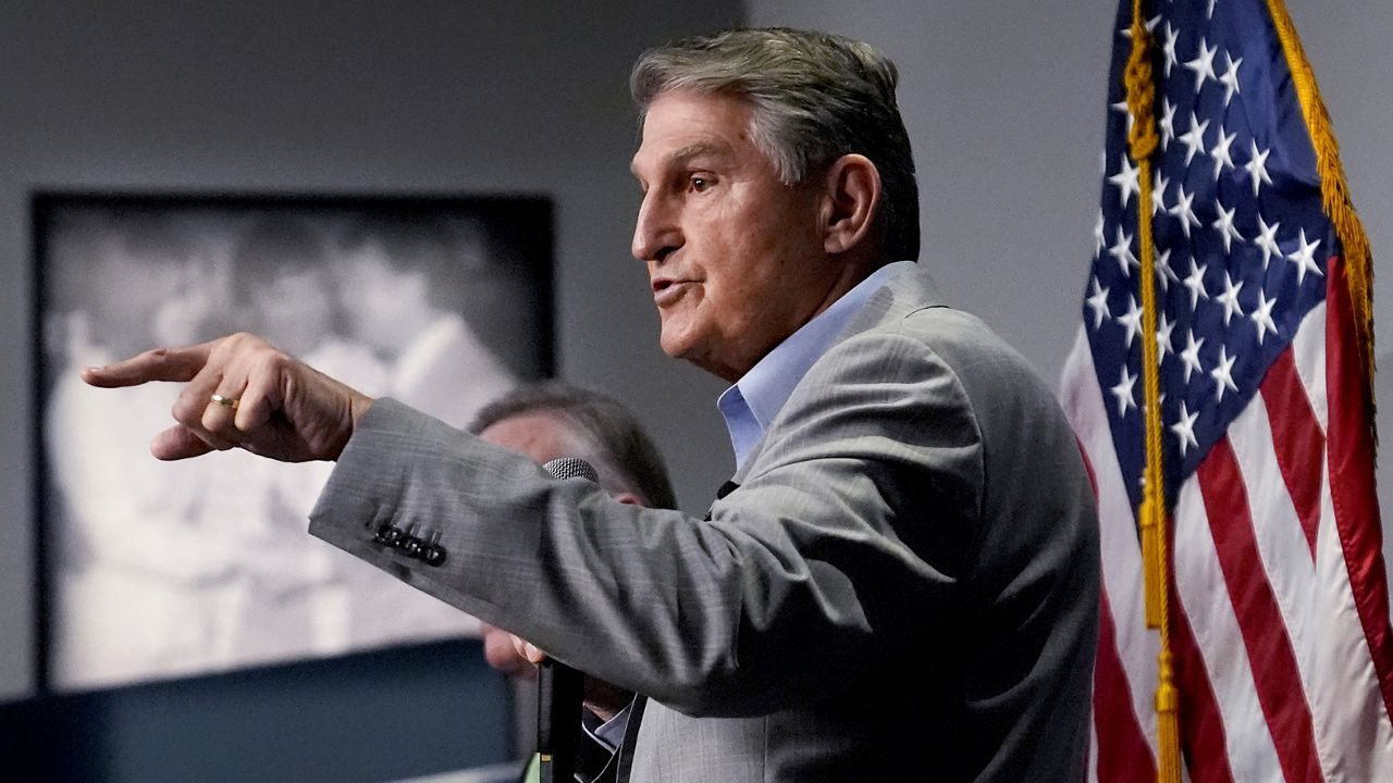 Sen. Joe Manchin, D-W.Va., gestures while addressing guests during the Politics and Eggs event, as part of his national listening tour, Friday, Jan. 12, 2024, in Manchester, N.H. Manchin announced last November that he would not seek reelection in 2024 and has teased a potential third-party run for the presidency. (AP Photo/Charles Krupa)