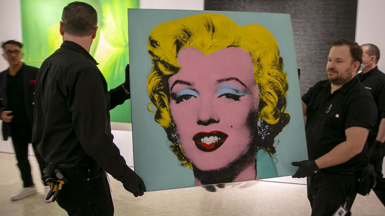 The 1964 painting Shot Sage Blue Marilyn by Andy Warhol is visible in Christie's showroom in New York City on Sunday, May 8, 2022. (AP Photo/Ted Shaffrey)