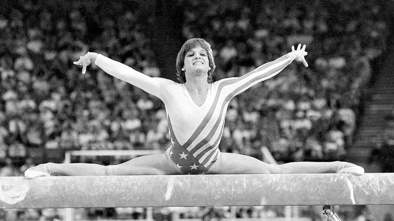 Mary Lou Retton, of the United States, performs on the balance beam during the women's gymnastics individual all-around finals at the Summer Olympics on Aug. 3, 1984, in Los Angeles. Retton. 55, is in intensive care in a Texas hospital fighting a rare form of pneumonia, according to her daughter McKenna Kelley. (AP Photo/Suzanne Vlamis, File)