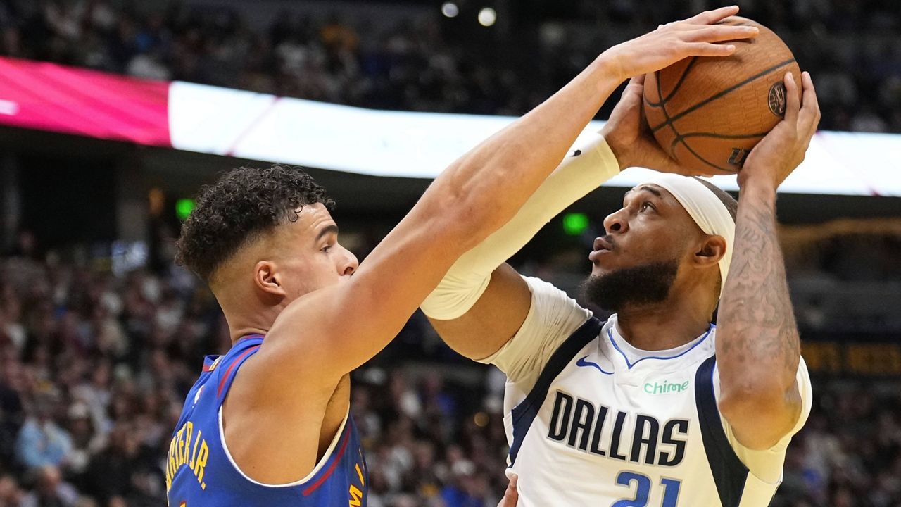 Mavericks recover after losing 24-point lead to beat Nuggets 123-120