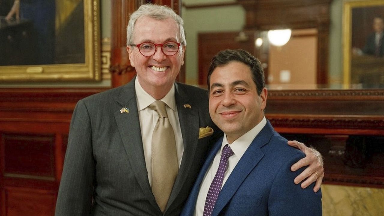 This photo, from the Office of the New Jersey Governor, shows Gov. Phil Murphy, as he announced the departure of his longtime Chief of Staff George Helmy, right, Sept. 22, 2023. Murphy named Helmy to serve as interim senator when Bob Menendez resigns later this month after his conviction on federal bribery charges, according to a person familiar with the decision. (Office of the New Jersey Governor via AP)