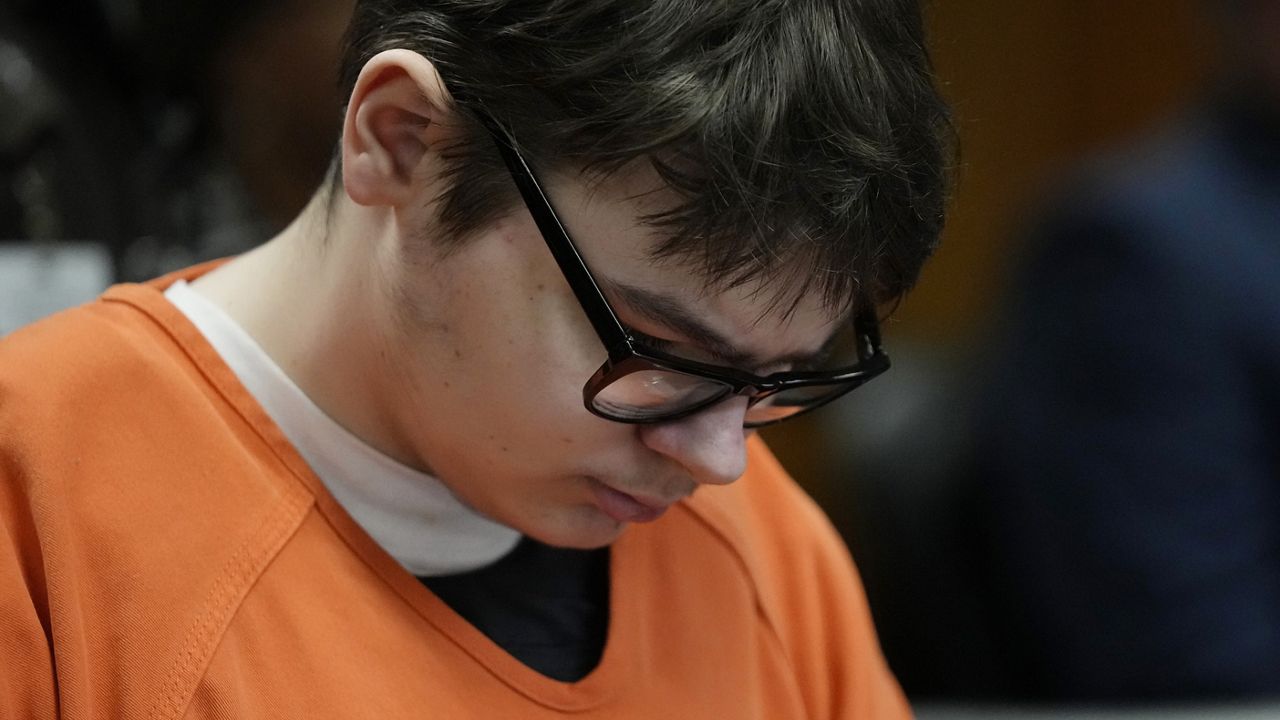 Ethan Crumbley sits in court listening to victim impact statements, Friday, Dec. 8, 2023, in Pontiac, Mich. (AP Photo/Carlos Osorio)