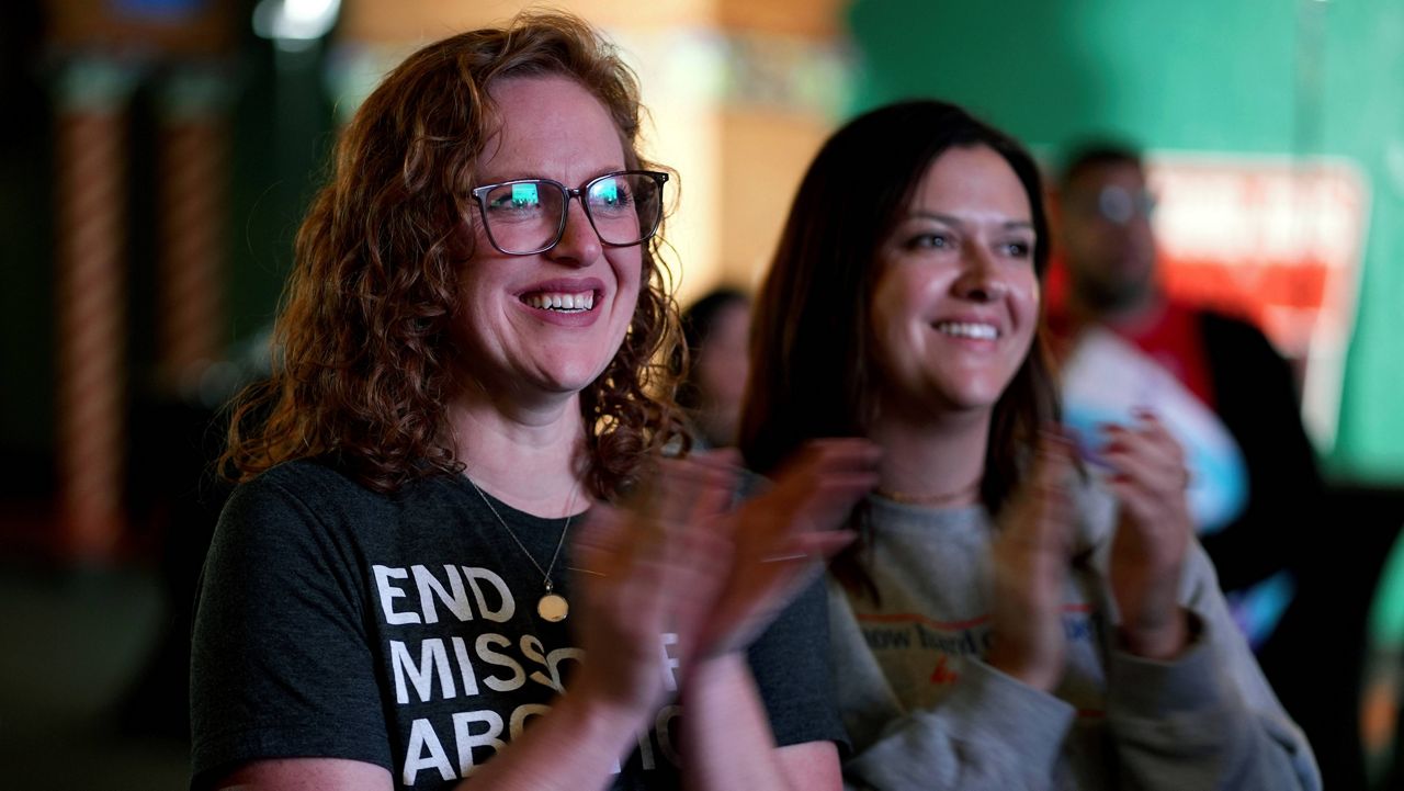 People only giving there first names Erika, left, and Leeann react after an abortion rights amendment to the Missouri constitution passed, Tuesday, Nov. 5, 2024, at a watch party in Kansas City, Mo. (AP Photo/Charlie Riedel, File)