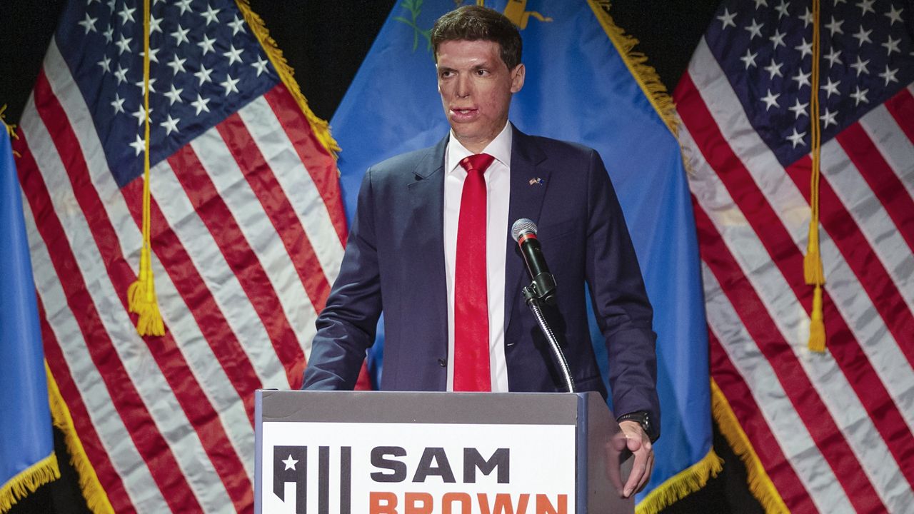 Republican senatorial candidate Sam Brown speaks at an election night party Tuesday, June 11, 2024, in Reno, Nev. (AP Photo/Tom R. Smedes)