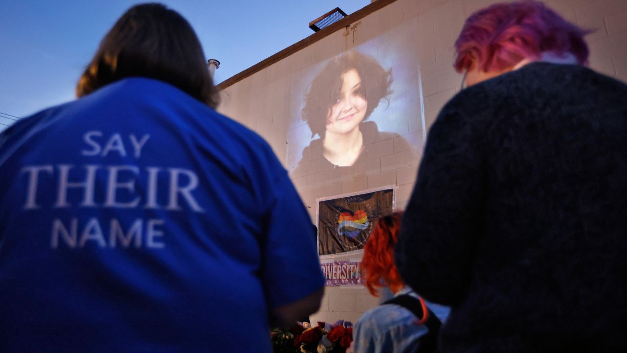 A photograph of Nex Benedict, a nonbinary teenager who died one day after a fight in a high school bathroom, is projected during a candlelight service on Saturday, Feb. 24, 2024 in Oklahoma City.