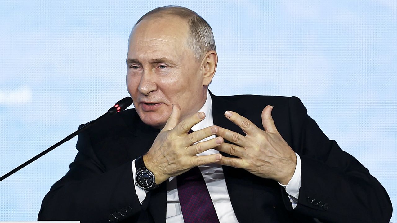 In this photo released by Roscongress Foundation, Russian President Vladimir Putin gestures while speaking at the Eastern Economic Forum in Vladivostok, Russia, Tuesday, Sept. 12, 2023. (Sergey Shinov, Roscongress Foundation via AP)