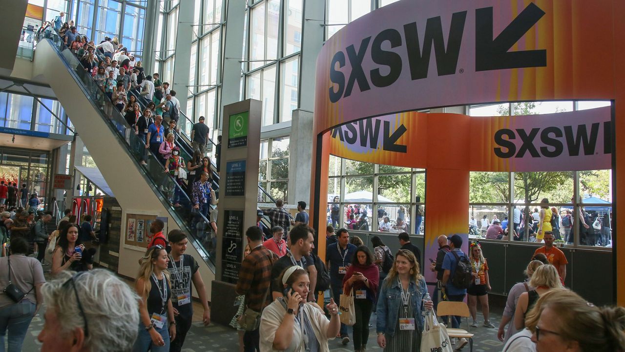 Attendees crowd the Austin Convention Center during the South by Southwest Film and Interactive Festivals on Saturday, March 11, 2023, in Austin, Texas. (Photo by Jack Plunkett/Invision/AP)
