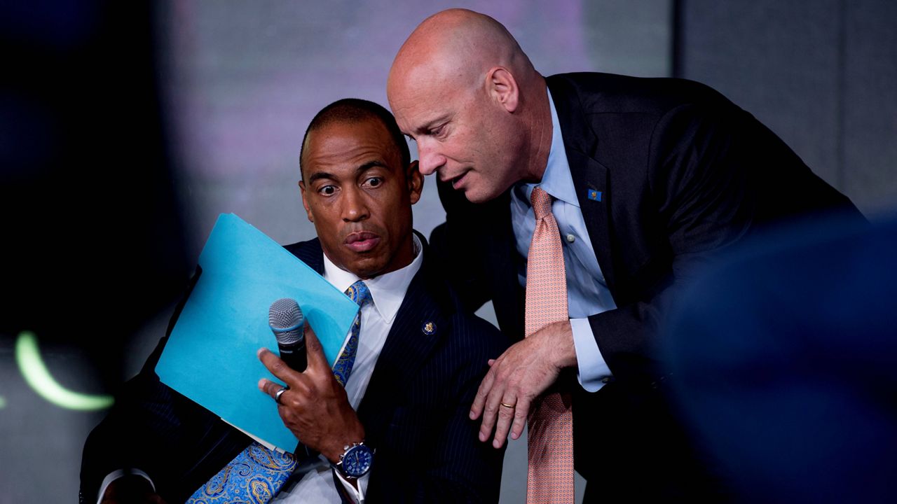 Vice President Mike Pence's Chief of Staff Marc Short, right, speaks with Scott Turner, Executive Director of the White House Opportunity and Revitalization Council, as Pence meets with community and faith leaders at Hope Christian Church, Friday, June 5, 2020, in Beltsville, Md. (AP Photo/Andrew Harnik)