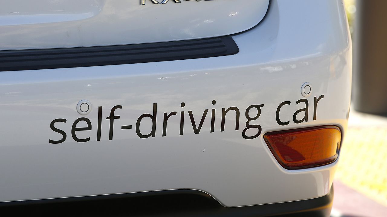 Google's self-driving Lexus car drives along street during a demonstration at Google campus on May 13, 2015, in Mountain View, Calif. (AP Photo/Tony Avelar)