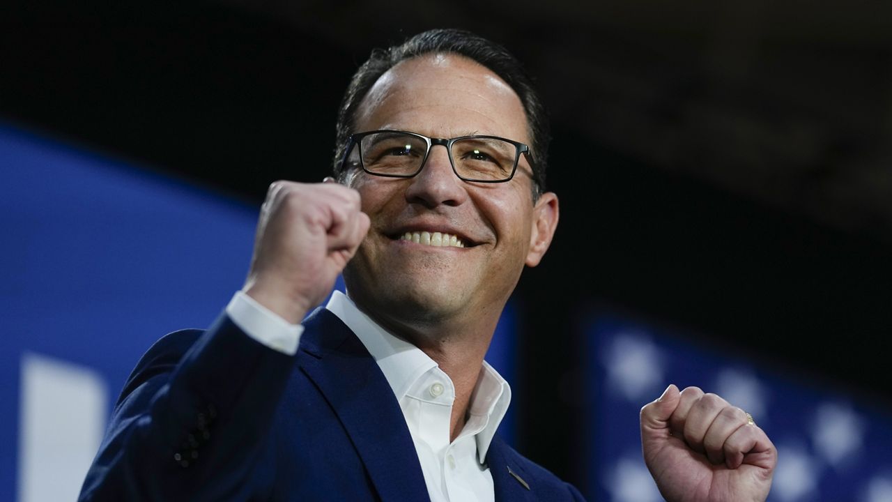 Pennsylvania Gov. Josh Shapiro gestures at a campaign event for Democratic presidential candidate Vice President Kamala Harris in Ambler, Pa., Monday, July 29, 2024. (AP Photo/Matt Rourke)