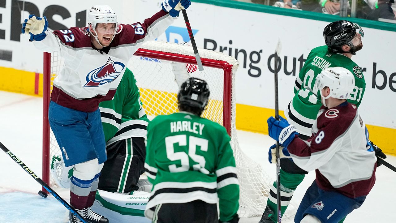 Colorado Avalanche left wing Artturi Lehkonen (62) reacts after teammate defenseman Cale Makar (8) scored a goal against the Dallas Stars during the third period in Game 5 of an NHL hockey Stanley Cup second-round playoff series, Wednesday, May 15, 2024, in Dallas. Looking on are Stars' Thomas Harley (55) and Tyler Seguin (91). (AP Photo/Tony Gutierrez)