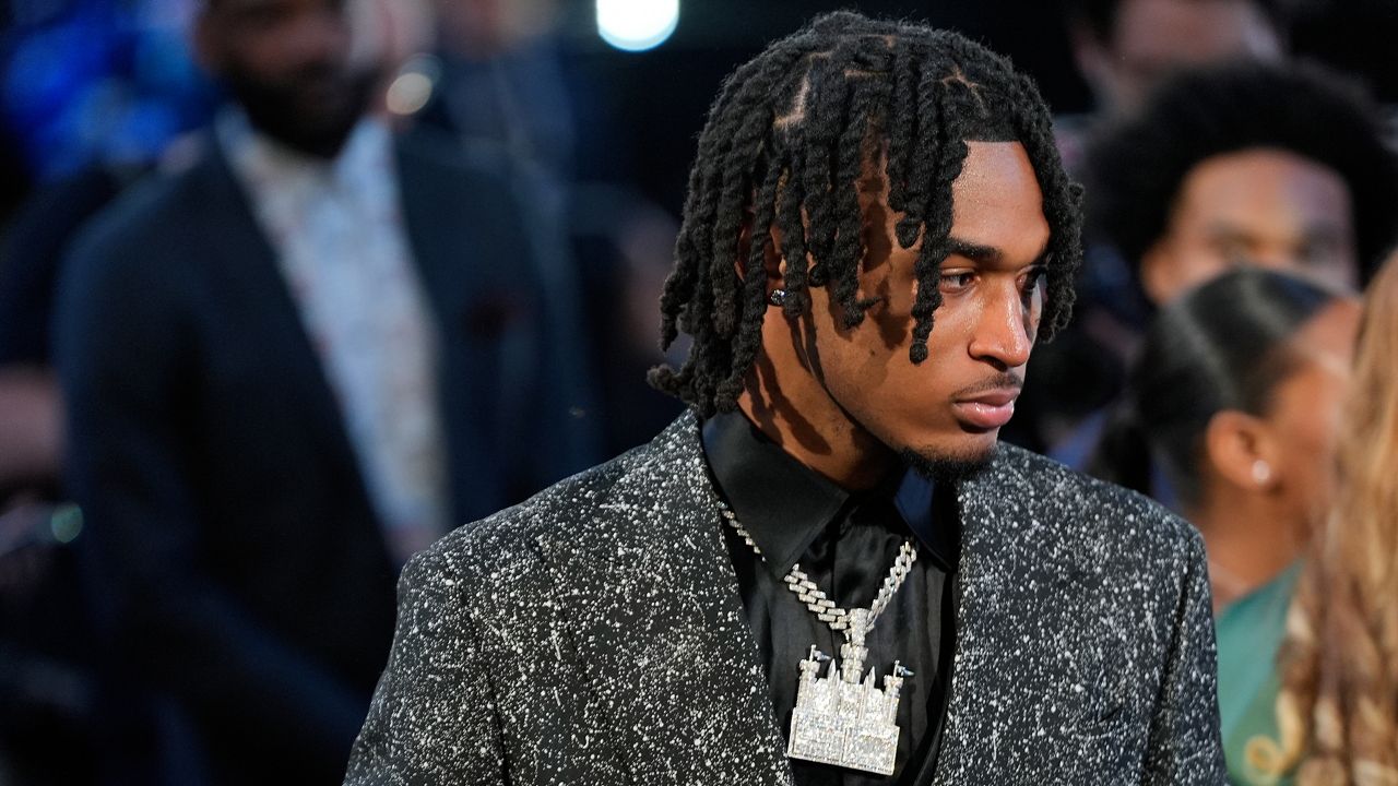 Stephon Castle reacts after being selected by the San Antonio Spurs as the fourth pick in the first round of the NBA basketball draft, Wednesday, June 26, 2024, in New York. (AP Photo/Julia Nikhinson)