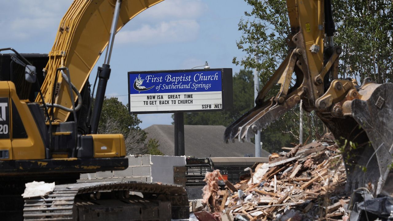 Workers continue demolition of the First Baptist Church where a gunman killed more than two dozen worshipers in 2017, in Sutherland Springs, Texas, Monday, Aug. 12, 2024. (AP Photo/Eric Gay)