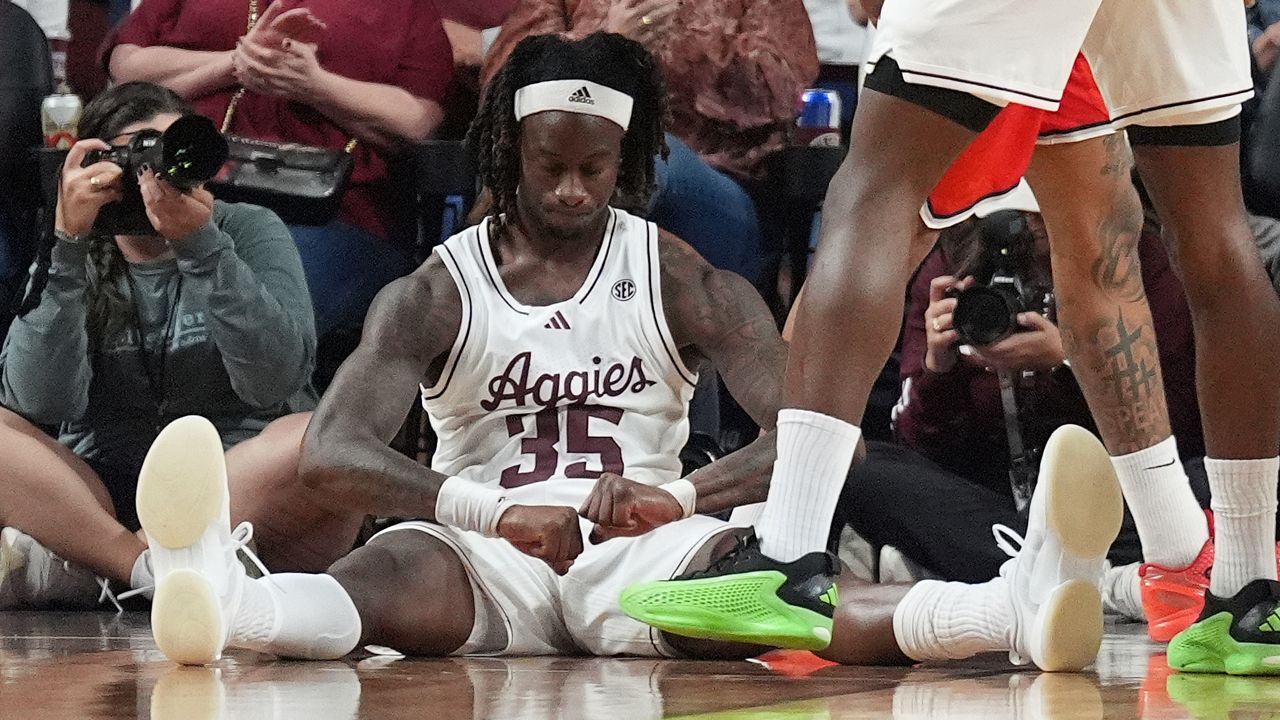 Texas A&M guard Manny Obaseki (35) reacts after being fouled on an and one shot against Ohio State during the second half of an NCAA college basketball game Friday, Nov. 15, 2024, in College Station, Texas. (AP Photo/Sam Craft)