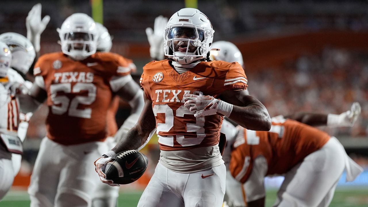 Texas running back Jaydon Blue (23) scores a touchdown against Louisiana-Monroe during the first half of an NCAA college football game in Austin, Texas, Saturday, Sept. 21, 2024. (AP Photo/Eric Gay)