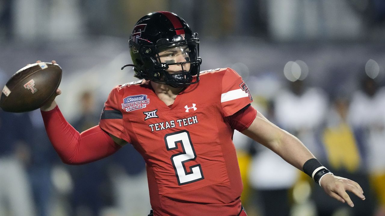 Texas Tech quarterback Behren Morton (2) passes against California during the Independence Bowl NCAA college football game, Dec. 16, 2023, in Shreveport, La. (AP Photo/Rogelio V. Solis)