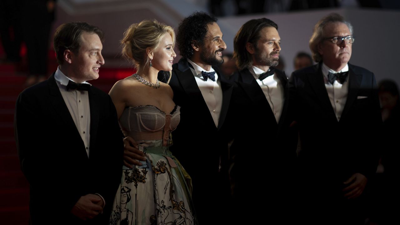 Gabriel Sherman, from left, Maria Bakalova, director Ali Abbasi, Sebastian Stan, and Martin Donovan pose for photographers upon departure from premiere of the film 'The Apprentice' at the 77th international film festival, Cannes, southern France, Monday, May 20, 2024. (Photo by Scott A Garfitt/Invision/AP)