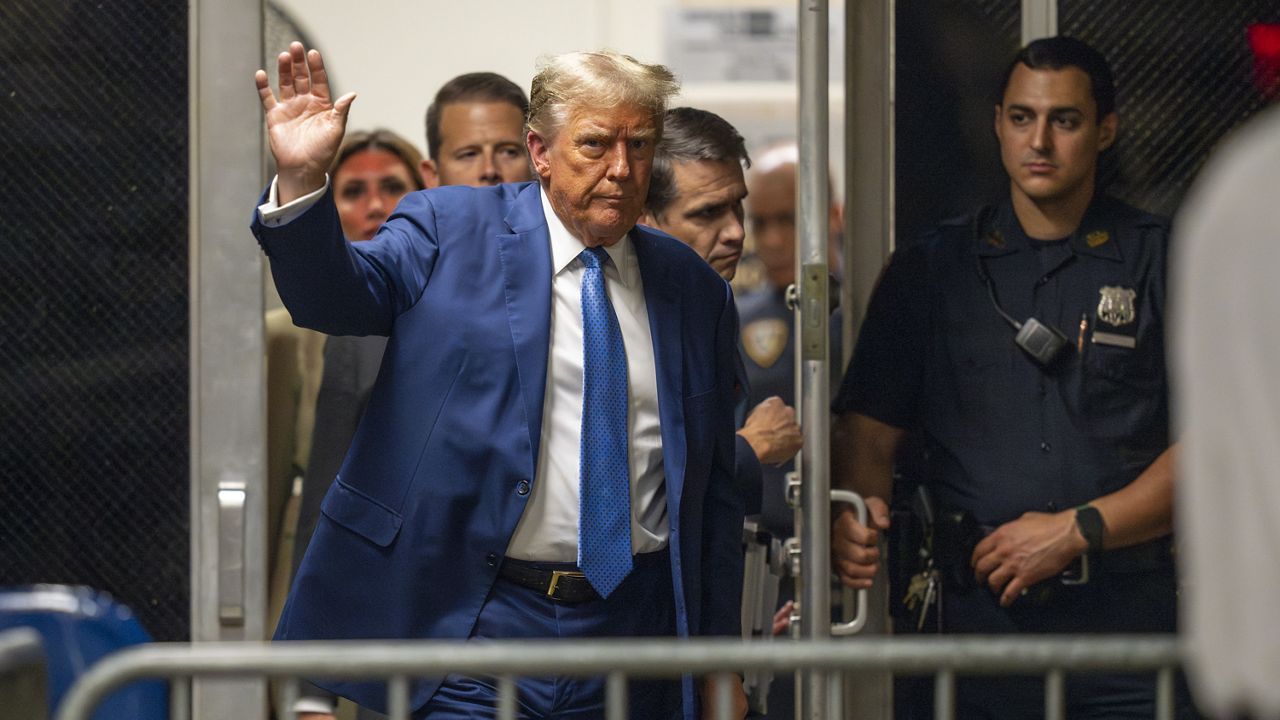 Former President Donald Trump returns from lunch to his trial at the Manhattan Criminal court, Monday, May 20, 2024, in New York. (Steven Hirsch/New York Post via AP, Pool, File)