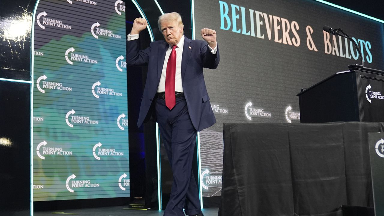 Republican presidential candidate former President Donald Trump dances as he walks off stage at the Turning Point Believers' Summit, Friday, July 26, 2024, in West Palm Beach, Fla. (AP Photo/Alex Brandon)