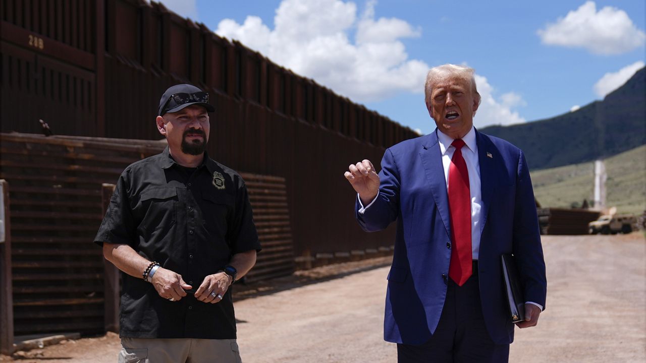 Republican presidential nominee former President Donald Trump talks as Paul Perez, president of the National Border Patrol Council, listens as he tours the southern border with Mexico, Thursday, Aug. 22, 2024, in Sierra Vista, Ariz. (AP Photo/Evan Vucci)