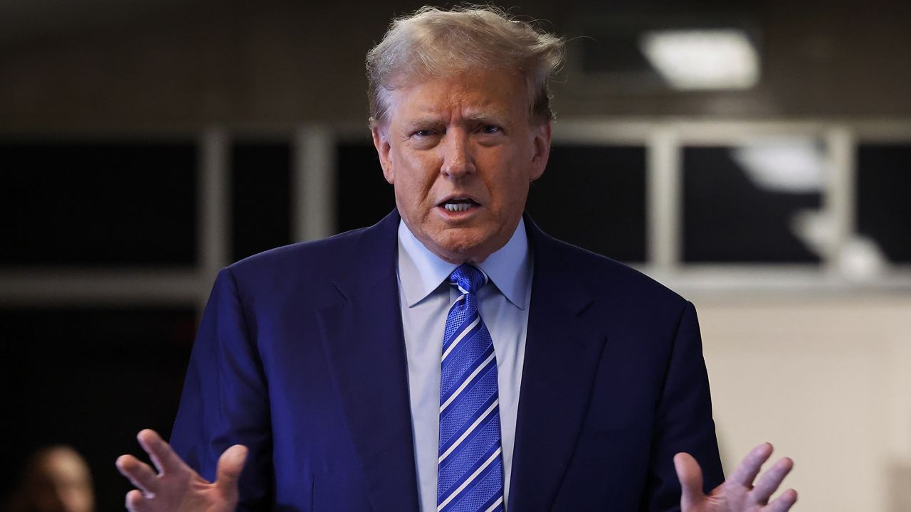 Former President Donald Trump speaks to the media as he arrives for the second day of jury selection at Manhattan criminal court, Tuesday, April 16, 2024, in New York. (Michael M. Santiago/Pool Photo via AP)