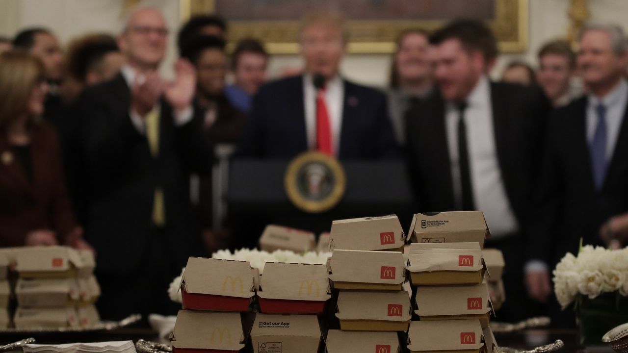 President Donald Trump welcomes 2018 NCAA FCS College Football Champions, The North Dakota State Bison, to the State Dining room of the White House in Washington, Monday, March 4, 2019, with McDonald's and Chick-fil-A fast food. (AP Photo/Carolyn Kaster)