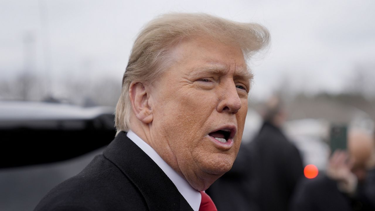 Republican presidential candidate former President Donald Trump addresses members of the press during a campaign stop in Londonderry, N.H., Tuesday, Jan. 23, 2024. (AP Photo/Matt Rourke)